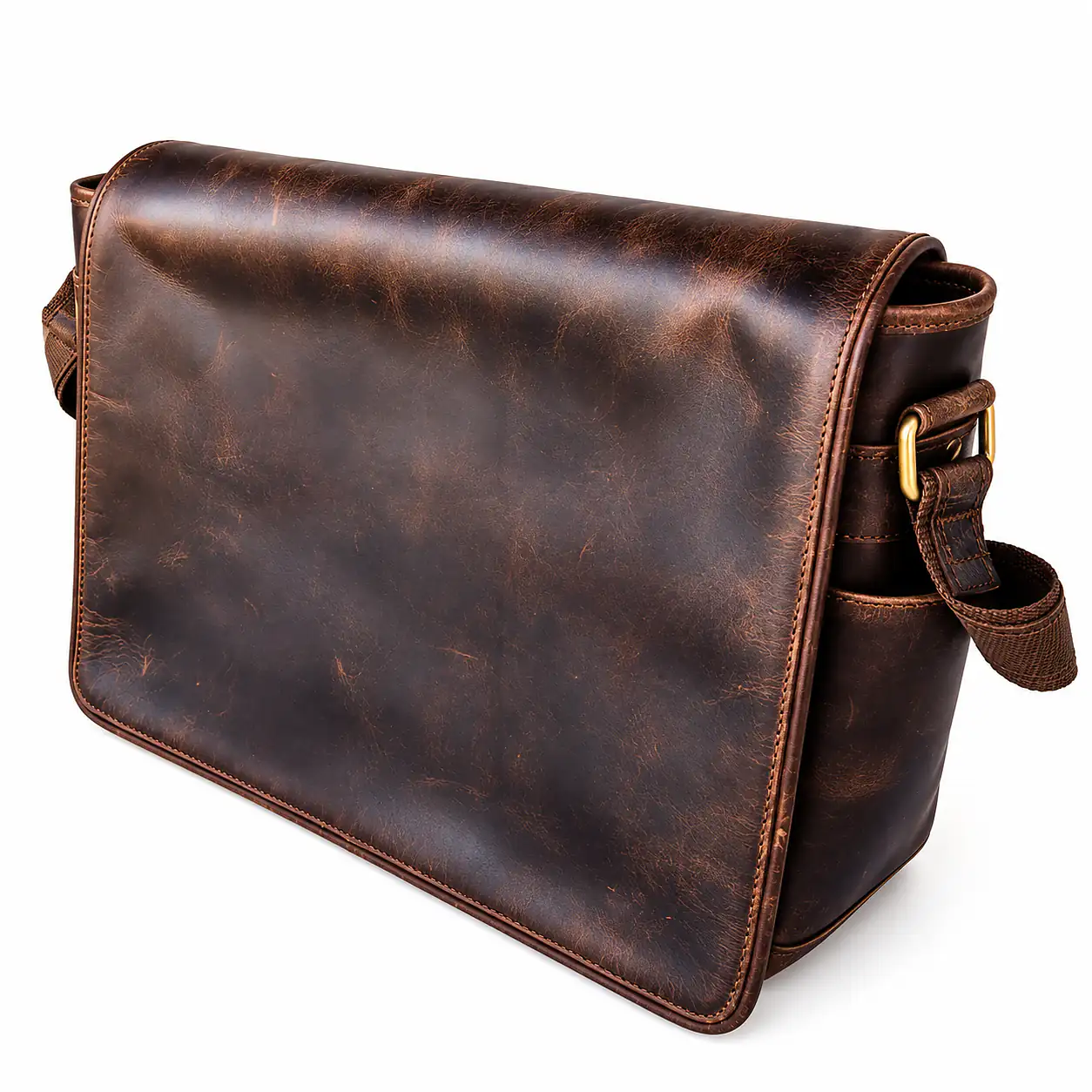 Dark brown flap messenger bag showing side profile and shoulder strap connection